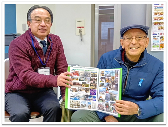  会員の石塚 良英さん（右）来訪
